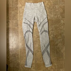 Lululemon High-Waisted Leggings w/ mesh cutout detail.